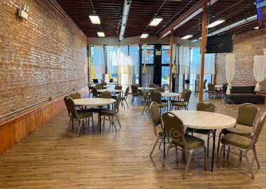 Beautiful , Spacious Event Venue with Exposed Brick and a Fish Tank